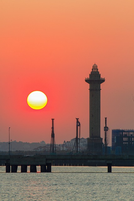 Free Sunset Lighthouse photo and picture