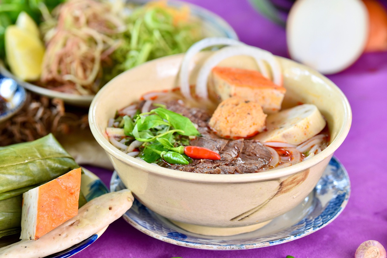 Bowl of beef and egg noodles in savory broth