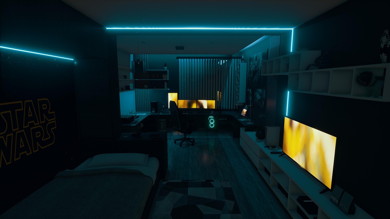 Quarto com área de jogos e iluminação azul posicionada nas paredes e atrás dos equipamentos.
