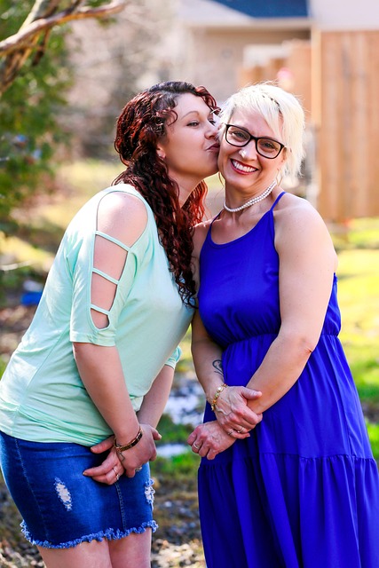 Women, happy mothers day, mother and daughter and kiss — photo by u_hd6qatizkb