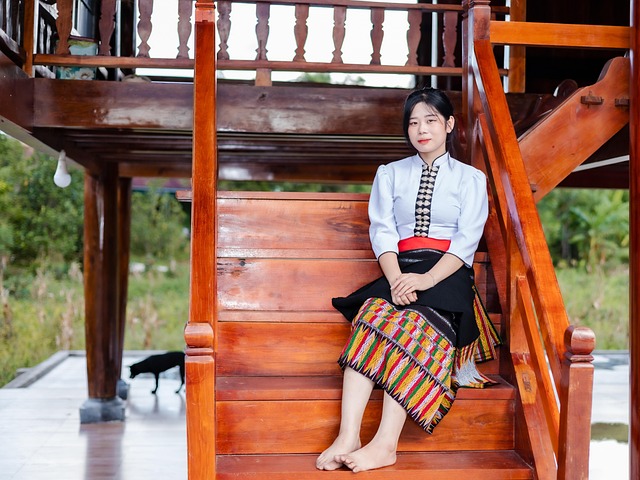 Free Thai Woman Stilt House photo and picture