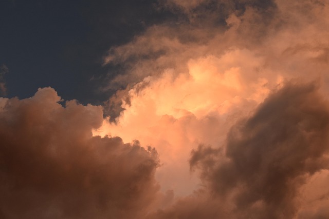Luminous clouds, sunset, stormy weather and rain — photo by JACLOU-DL