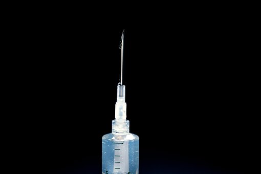 Free Vaccine Syringe photo and picture