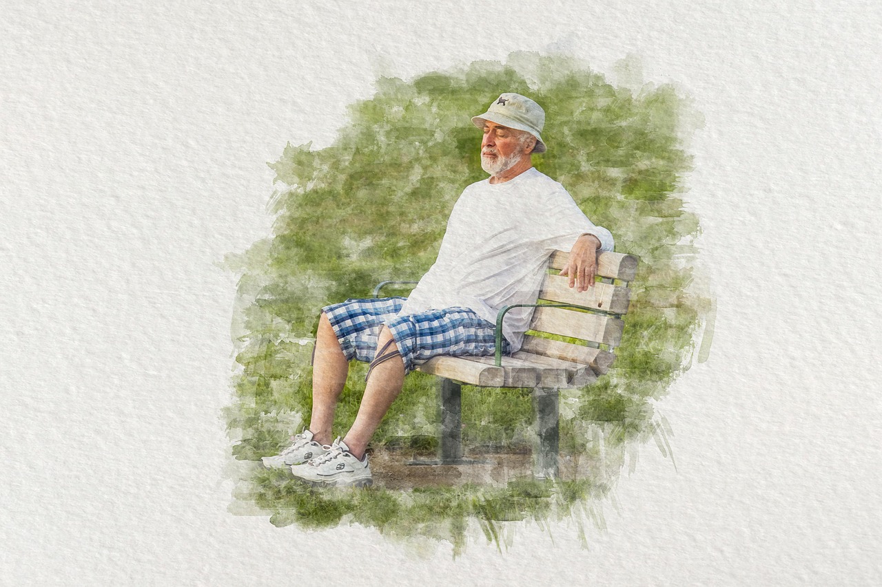 person sitting on a bench drawing