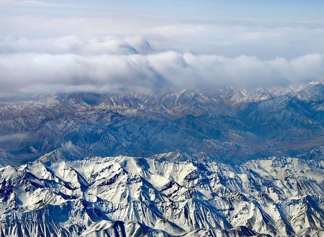 Free Snow Mountain Sea Of Clouds photo and picture