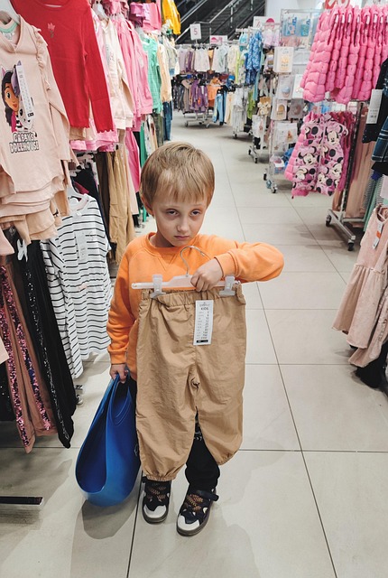 Free Little Boy Clothes Fitting photo and picture