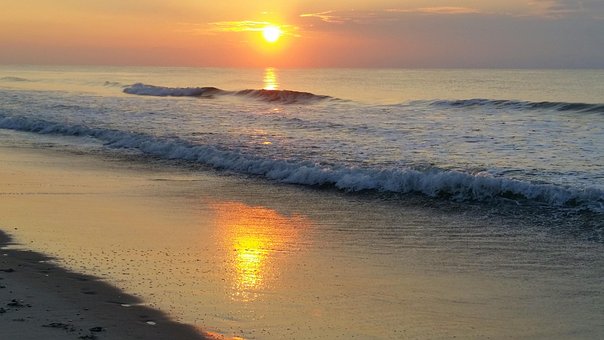 Free Sunrise Waves photo and picture