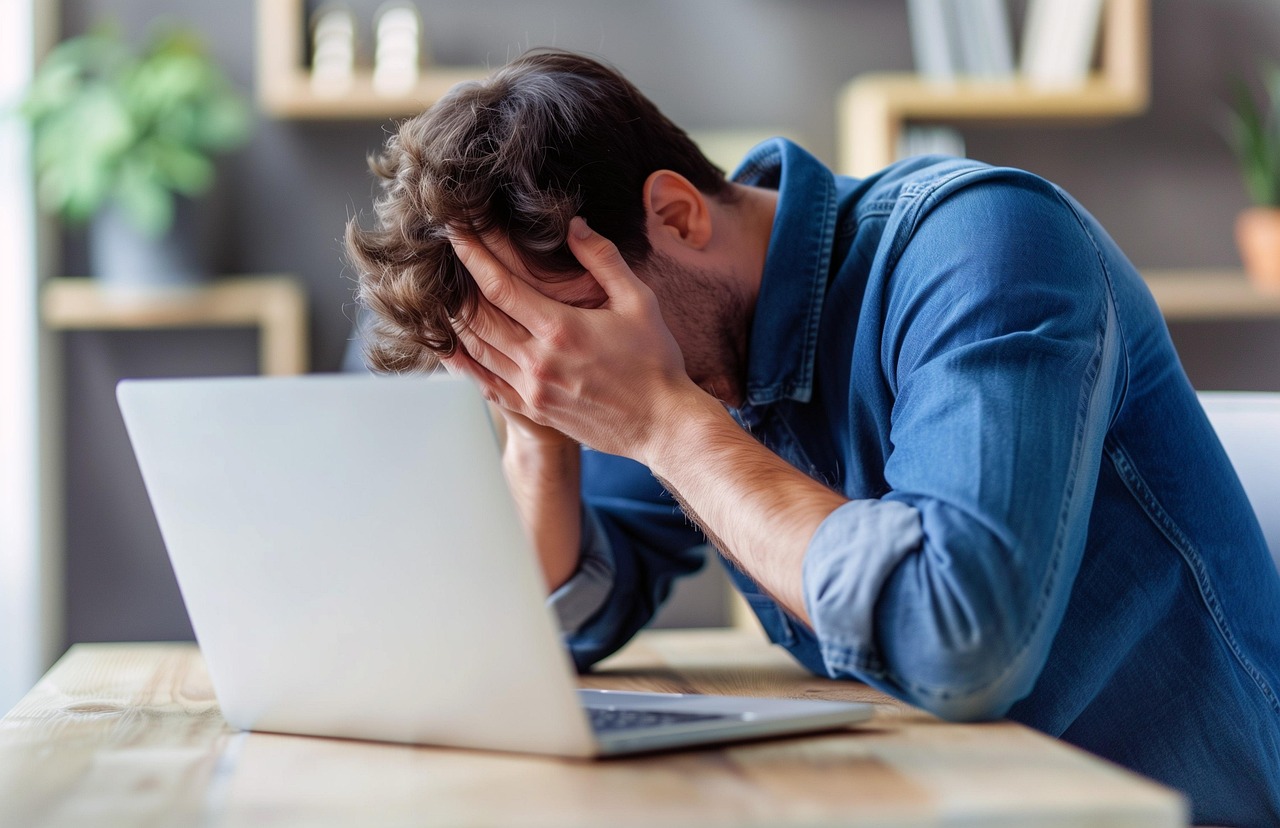 Free frustrated man laptop hands on face illustration