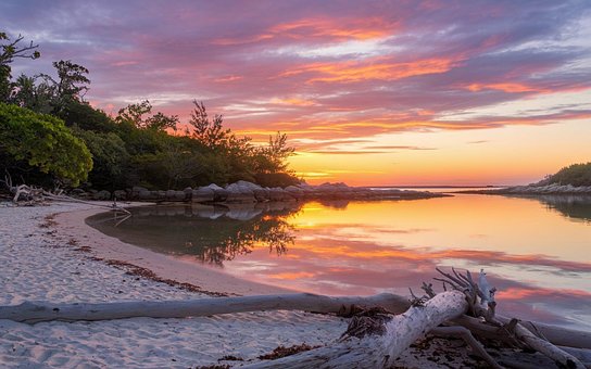 Free Beautiful Sunset On Peaceful Beach photo and picture