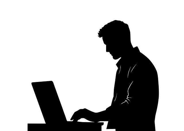 Free working silhouette laptop vector
