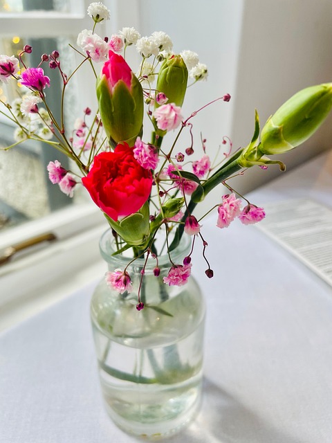 Free Flowers In A Vase Table Decoration photo and picture