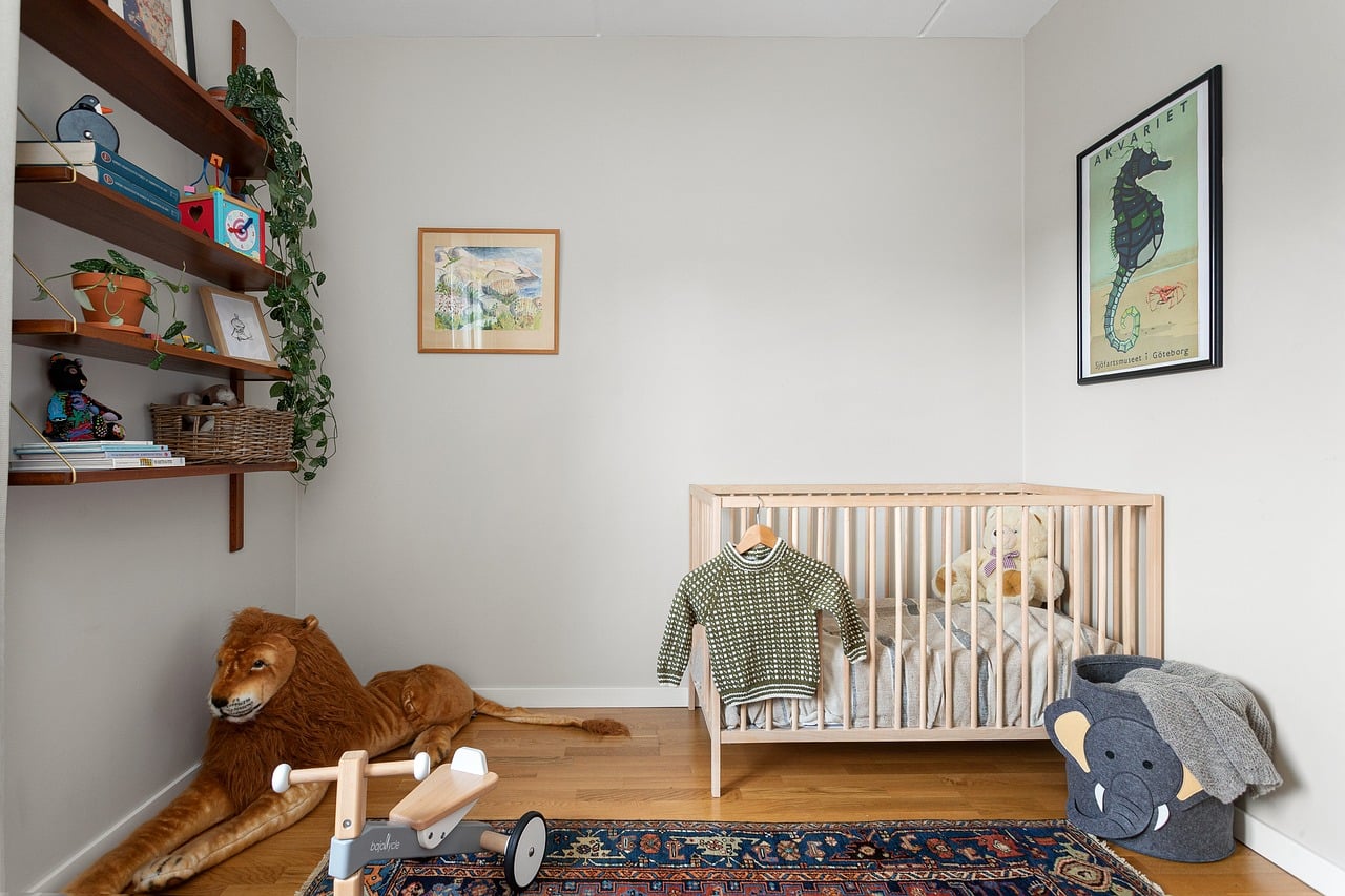 Small compact nursery room design with smart storage UK