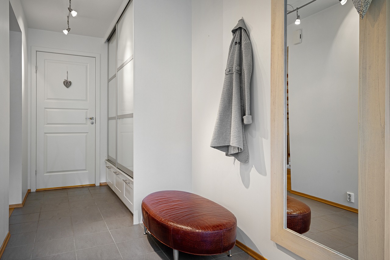 Slim hallway bench and narrow console table for small foyer storage