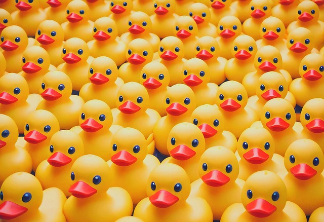 Free ai generated rubber duckies yellow illustration