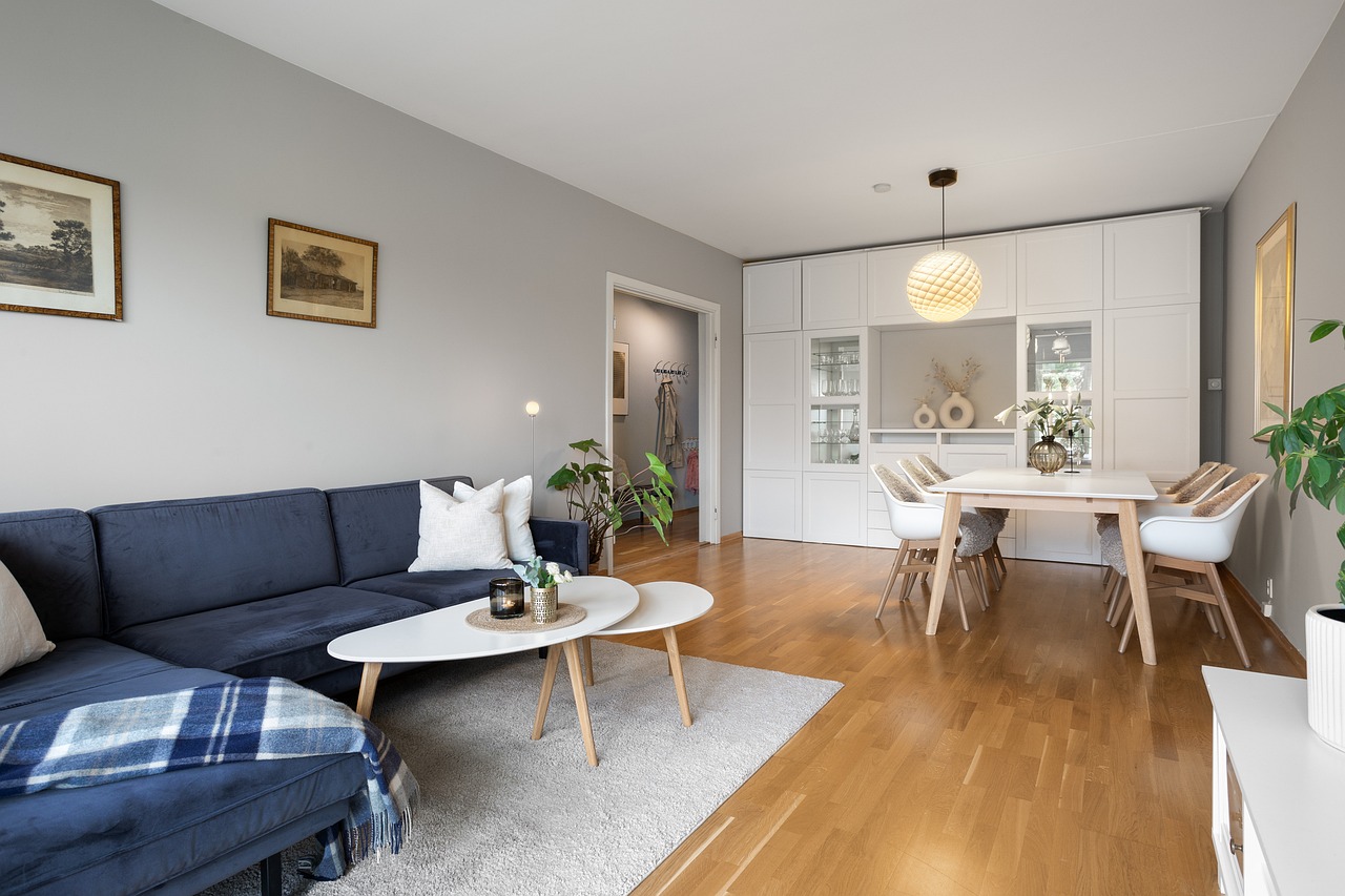 blue and beige living room colour combination with wood accents