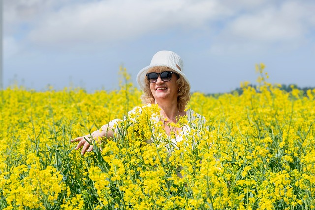 mature woman, lupines, good mood, blonde, hat, sunny day, belarus