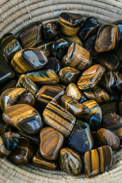 alternative medicine, brown stones, decorative, gemstone, mineral, earth tones, glittering, golden hue, basket, meditation, quiet, energy, balance