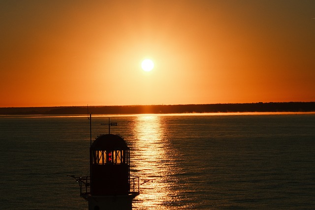 Free Sunrise Lighthouse photo and picture