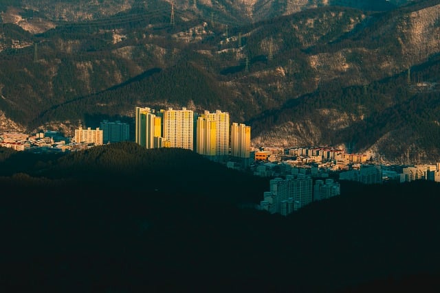 Free Apartment Buildings Mountain Cityscape photo and picture