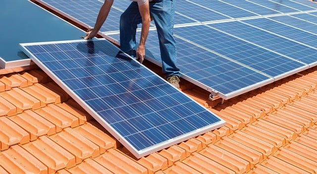 solar panel, roof, installation, renewable energy, solar energy, ecology, sustainability, solar technology, energy efficiency, photovoltaics, worker, roof tile, clay color, outdoor, technology, maintenance, workwear, panel, industry, roof work