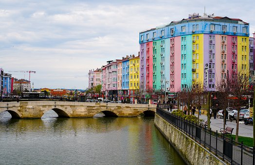 Free Colorful Buildings Bridge Over River photo and picture