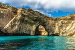 Random: malta, cave, nature, water, mediterranean, landscape, limestone, cliffs, arch cave, comino, blue water, summer day, coastal, clouds, rock formation, tourist attraction, natural beauty, european coast, clear water, natural monument