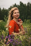 Random: woman, summer, fashion, style, model, posing, femininity, beauty, red dress, nature, smiling, blonde, field, landscape, garlic clove, fresh air, lace, apple, countryside, portrait, dress