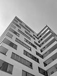 Random: apartment complex, modern architecture, city life, black and white photography, building facade, clouds, nature, balconies, housing, urban architecture, residential area, urban, high-rise building, exterior, modern apartment, windows, city house, housing estate, structural design