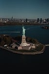Random: statue of liberty, new york, ellis island, world heritage icon, monument, tourist attraction, american symbol, freedom, historic site, ocean, skyscraper, nature, blue sky, city, hudson river, usa, port city, tourism, summer, panorama, bay, natural beauty