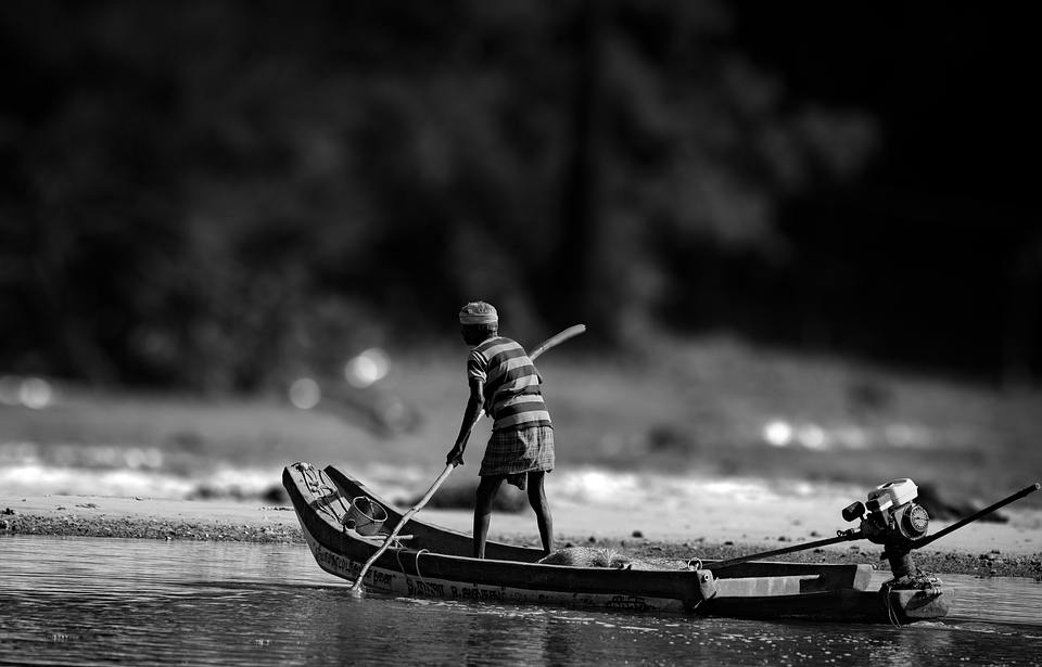 Man Rowing Boat Phot Traditional fisherman in canoe Photo - Pixabay