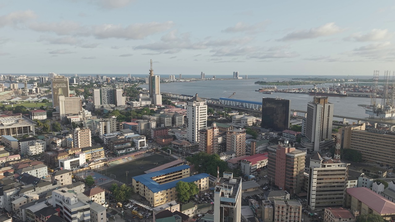 lagos island, lagos state, nigeria, ariel, skyline, done shot, lagos, aerial cityscape, cityscape, raw footage, city, beautiful skyline, buildings, atlantic ocean, sealife, aerial ocean, oceanic, city traffic, africa, abuja, modern urban life, urban life, african sunset, sunset