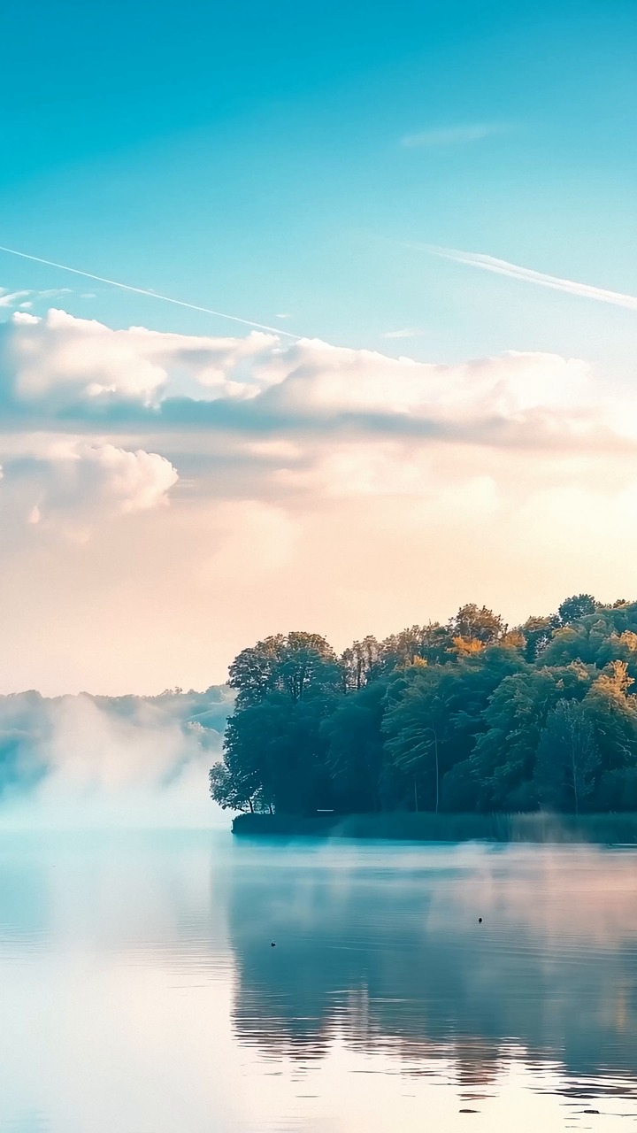 sunrise, lake, mist, reflection, light, morning, nature, peace, calm, serenity, beauty, clouds, horizon, sky, tranquility, dawn, water, landscape, soft, atmosphere, hope, shine, stillness, relax, silence, ai generated